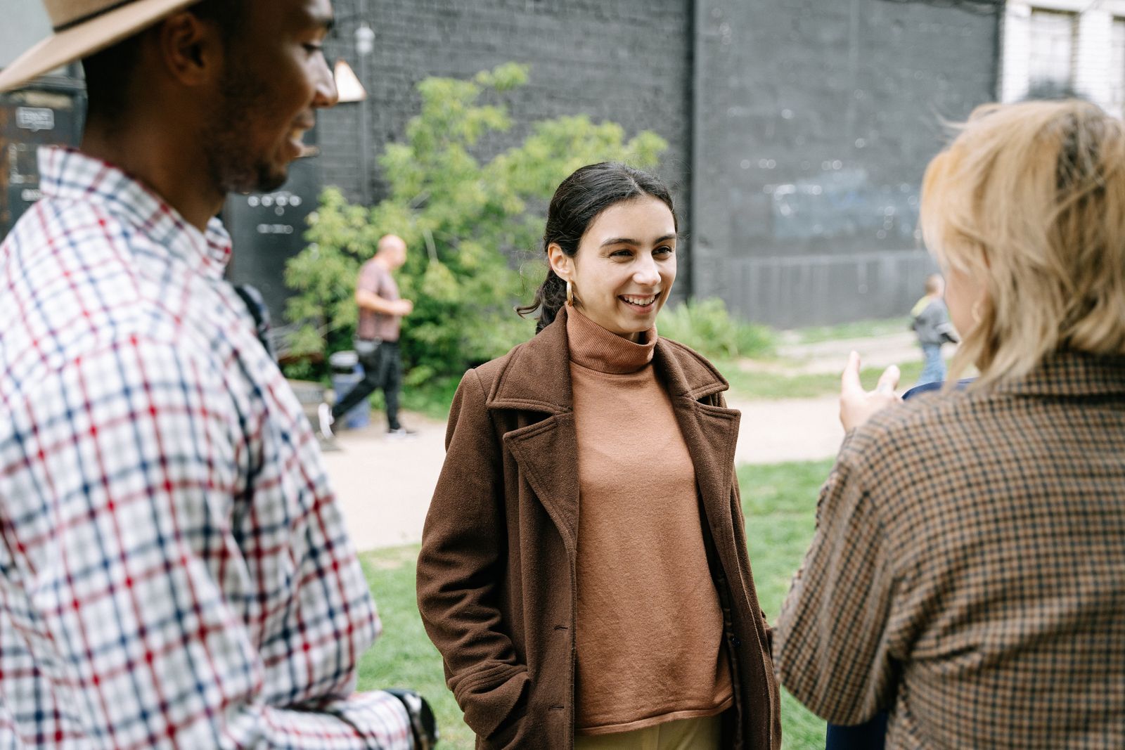 Friends having a conversation outdoors